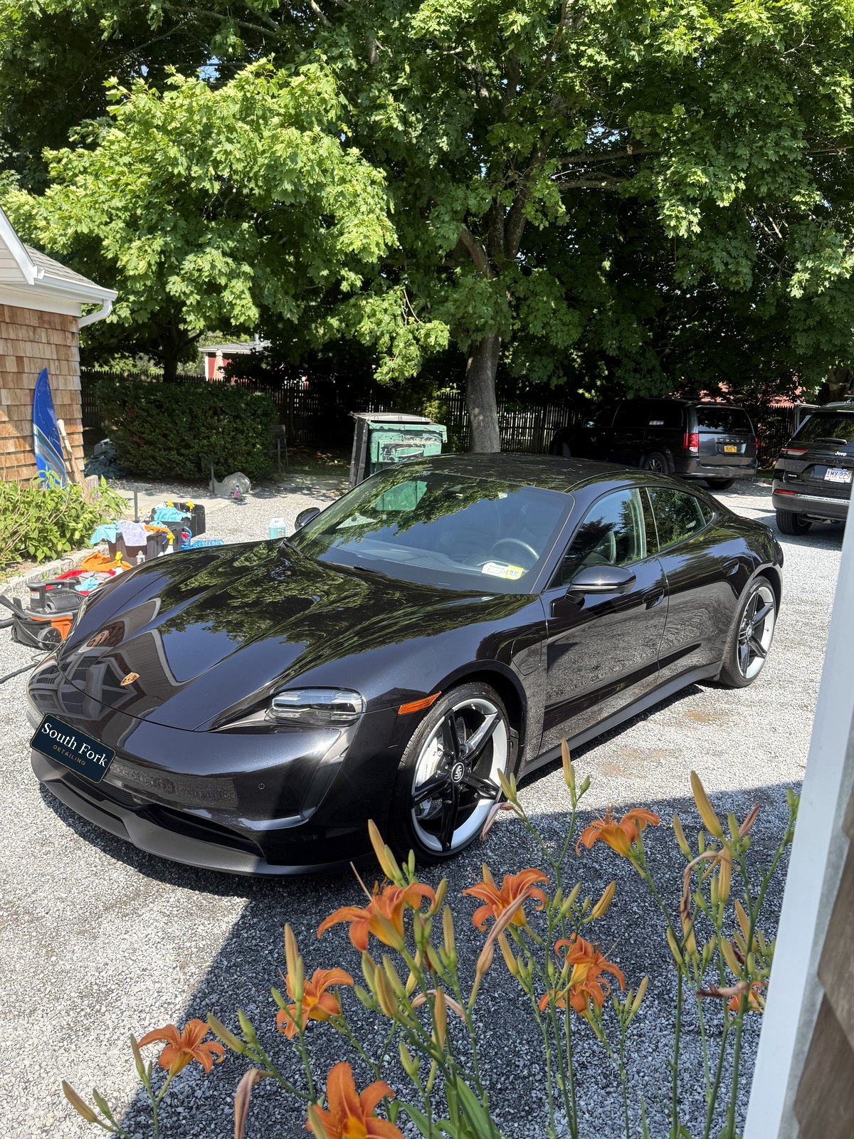 Black Porsche Taycan after a full detail